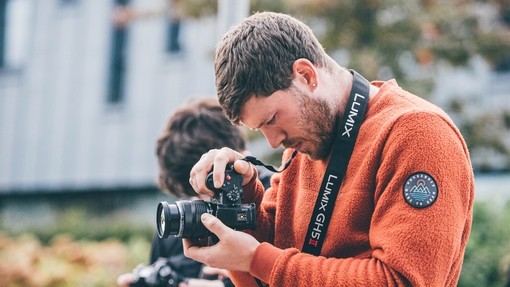 student using a camera