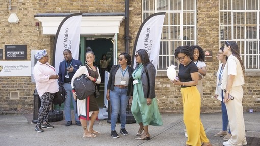 Group of people outside Winchester House London